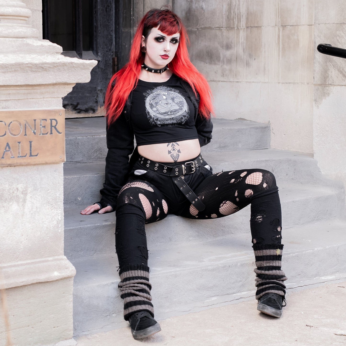 Model wearing Illuminor Graphic Crop Top in a gothic setting from Mr. Serial Killer