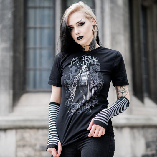 Gothic model wearing the Mr. Serial Killer Follow Your Shadow Graphic T-Shirt in a Victorian setting, capturing dark macabre fashion