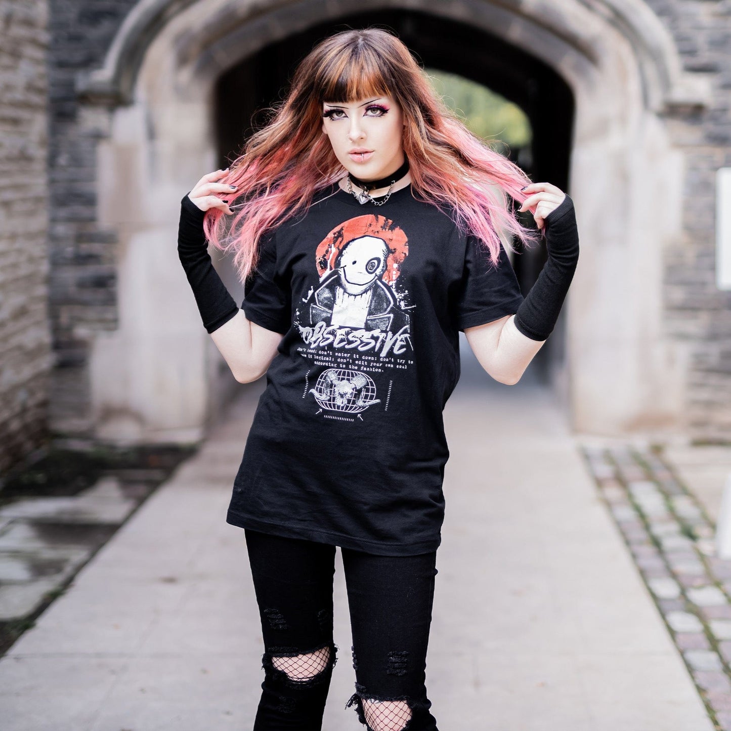 Gothic model wearing the Shadow of the Dark Mage T-Shirt in a Victorian setting, embodying horror and esoteric aesthetics.