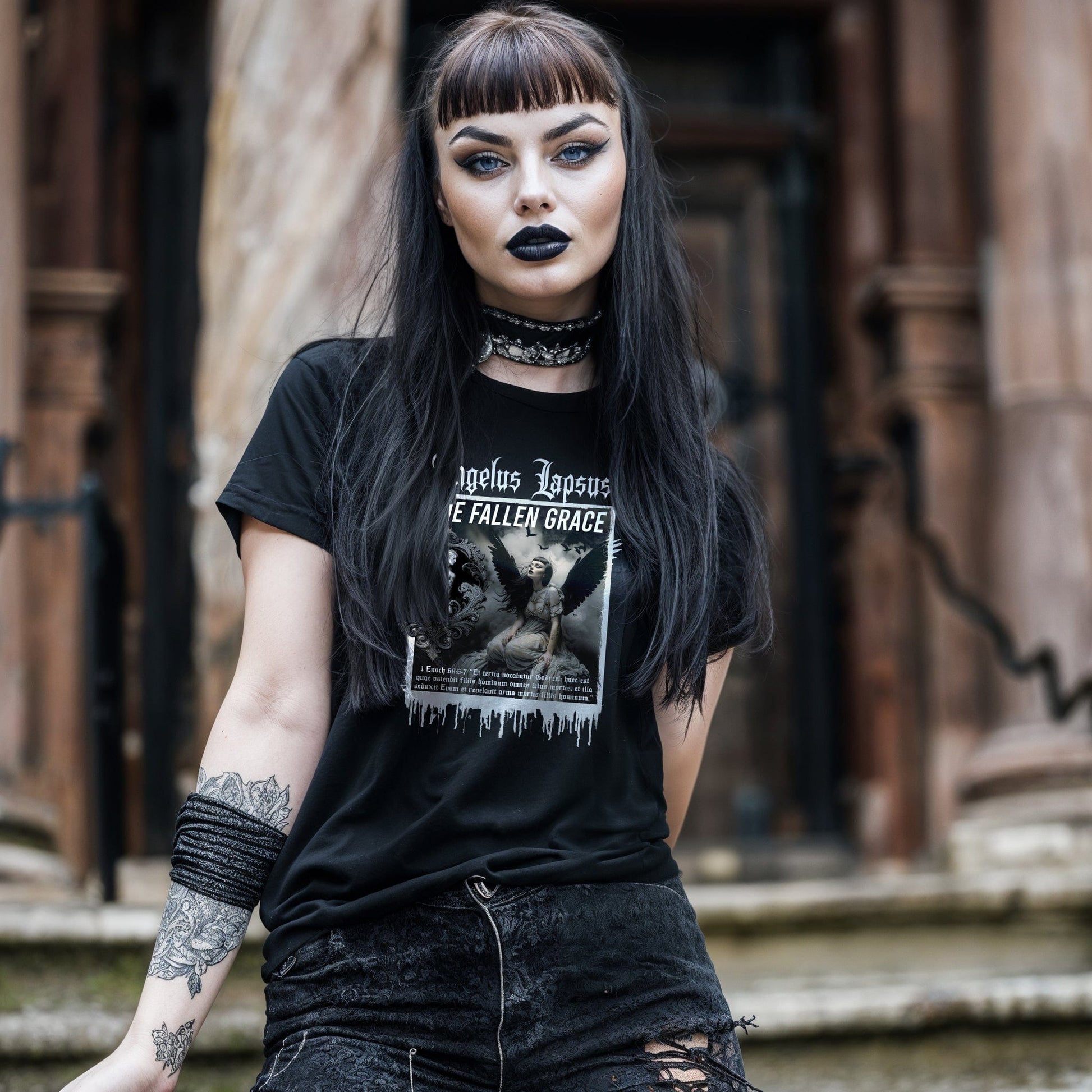 Goth model wearing Gadreel: The Fallen Grace - Tears of the Exiled Black Graphic T-Shirt