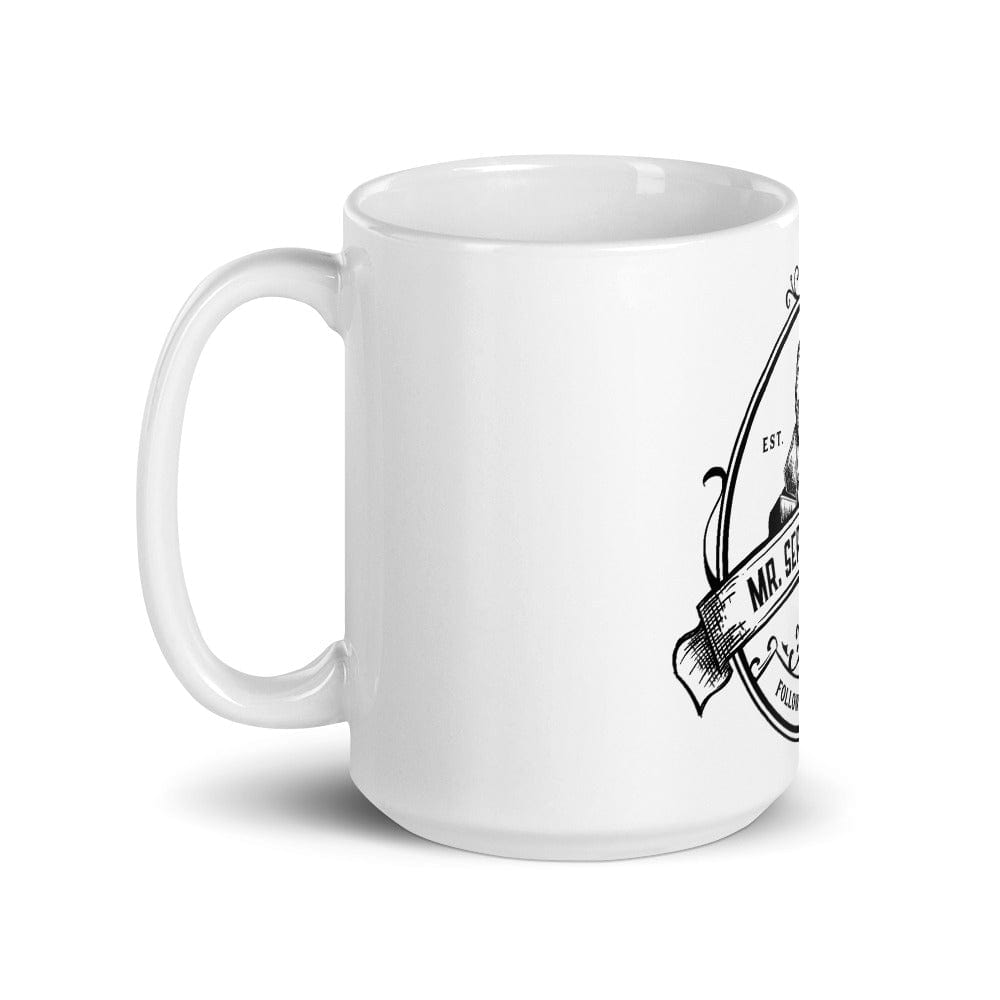 Mockup of the 'Follow Your Shadow' coffee mug featuring Mr. Serial Killer with a custom illustration and show logo, available in glossy white with black print, in 11oz and 15oz sizes.