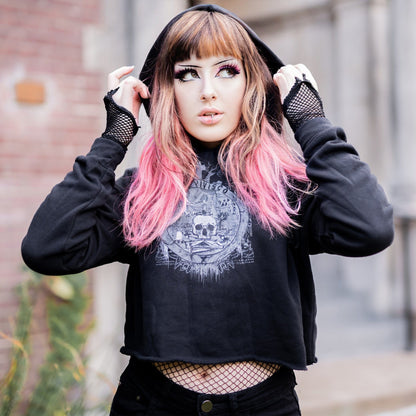 Goth model wearing the Revivisco Graphic Crop Hoodie, showcasing the ancient sigil design and dark aesthetic appeal.