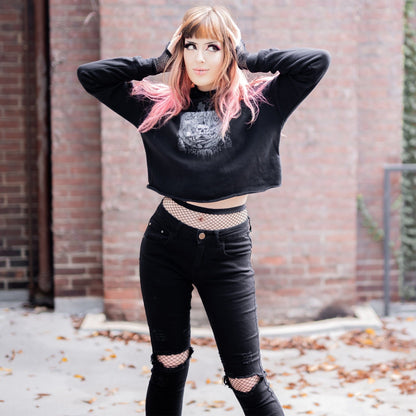 Goth model wearing the Revivisco Graphic Crop Hoodie, showcasing the ancient sigil design and dark aesthetic appeal.