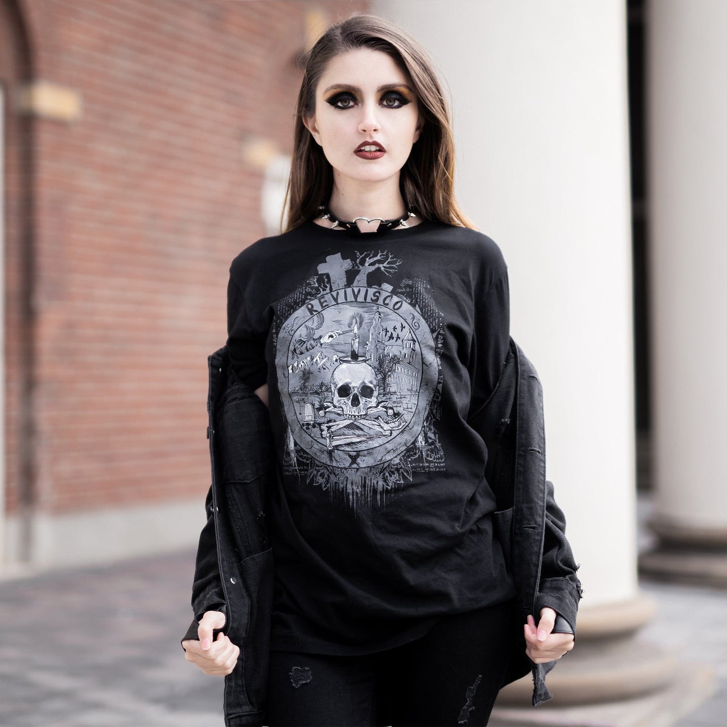 Goth model wearing the Revivisco Graphic T-Shirt, showcasing the ancient sigil design and dark aesthetic appeal.