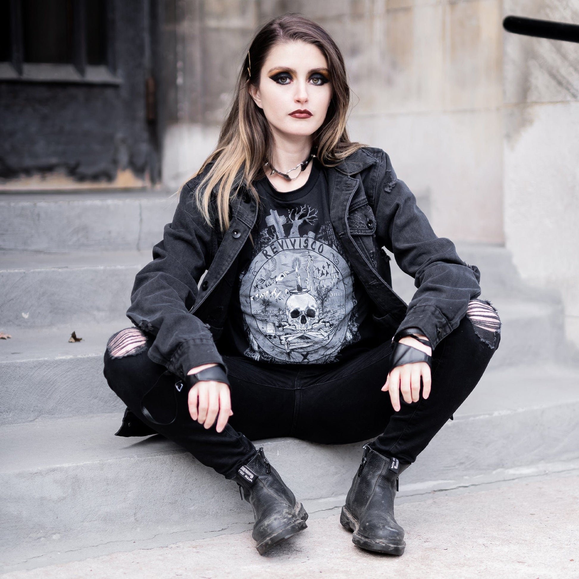 Goth model wearing the Revivisco Graphic T-Shirt, showcasing the ancient sigil design and dark aesthetic appeal.