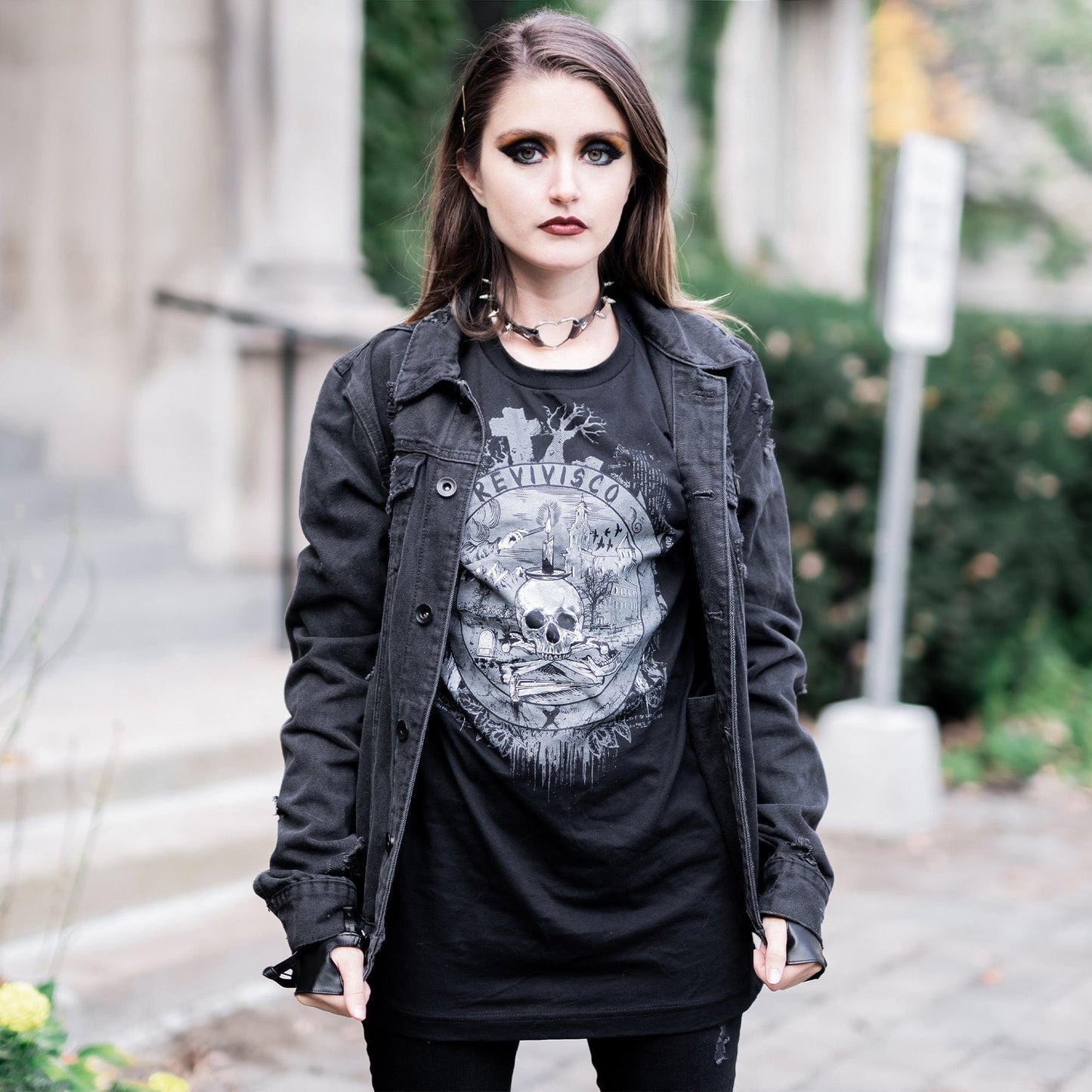 Goth model wearing the Revivisco Graphic T-Shirt, showcasing the ancient sigil design and dark aesthetic appeal.