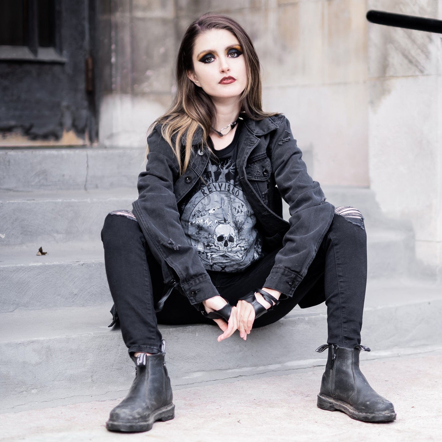 Goth model wearing the Revivisco Graphic T-Shirt, showcasing the ancient sigil design and dark aesthetic appeal.